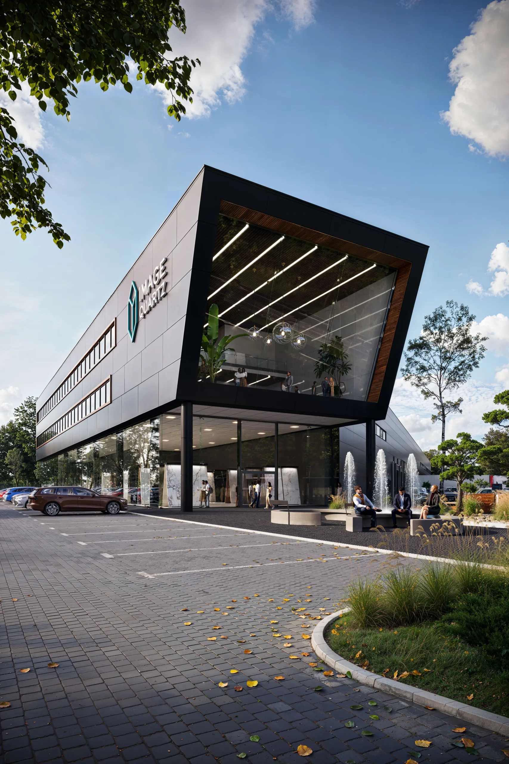 Modern black commercial building with large glass windows, outdoor fountains, and seating.