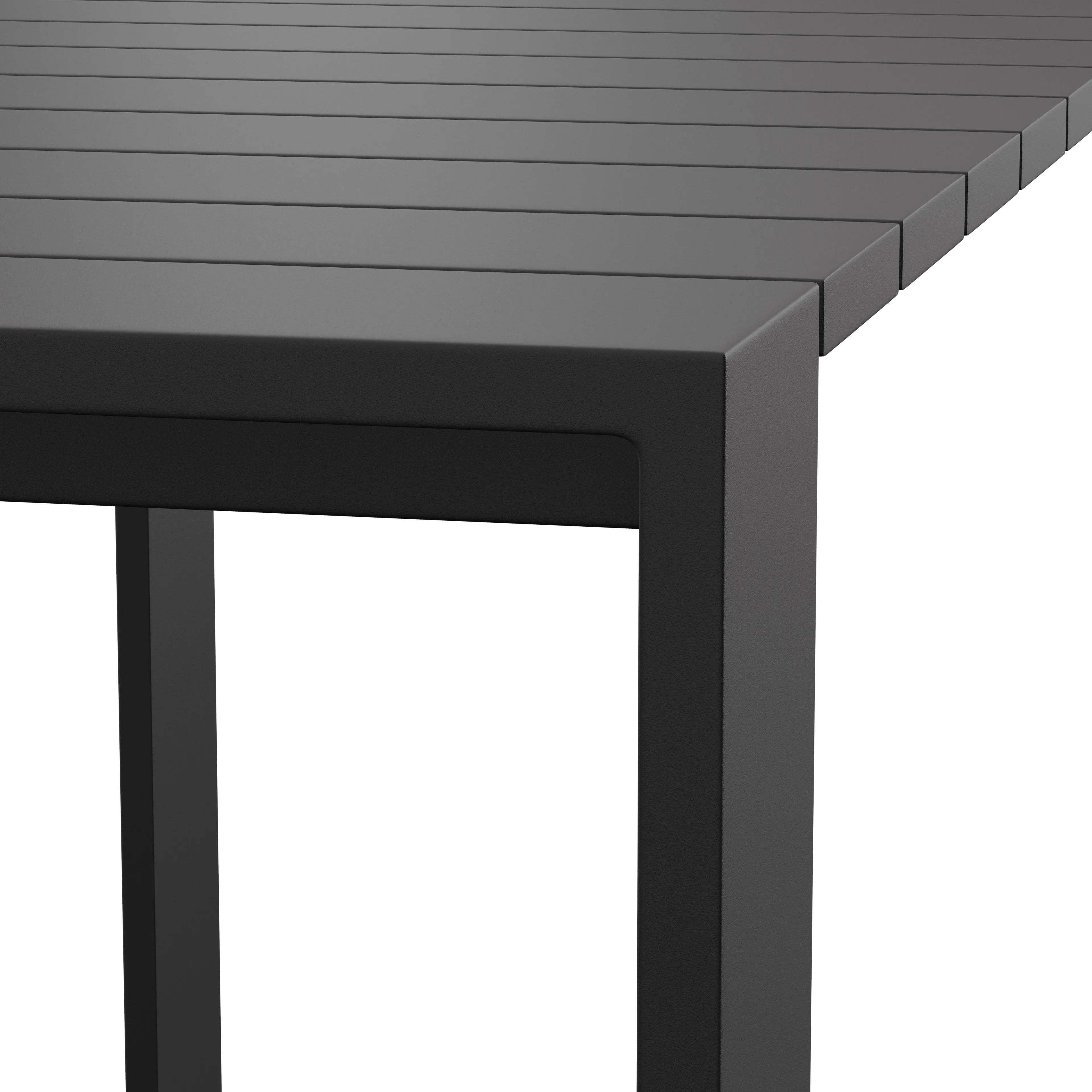Close-up of a modern dark gray slatted tabletop corner showing a square tubular metal leg and matte finish