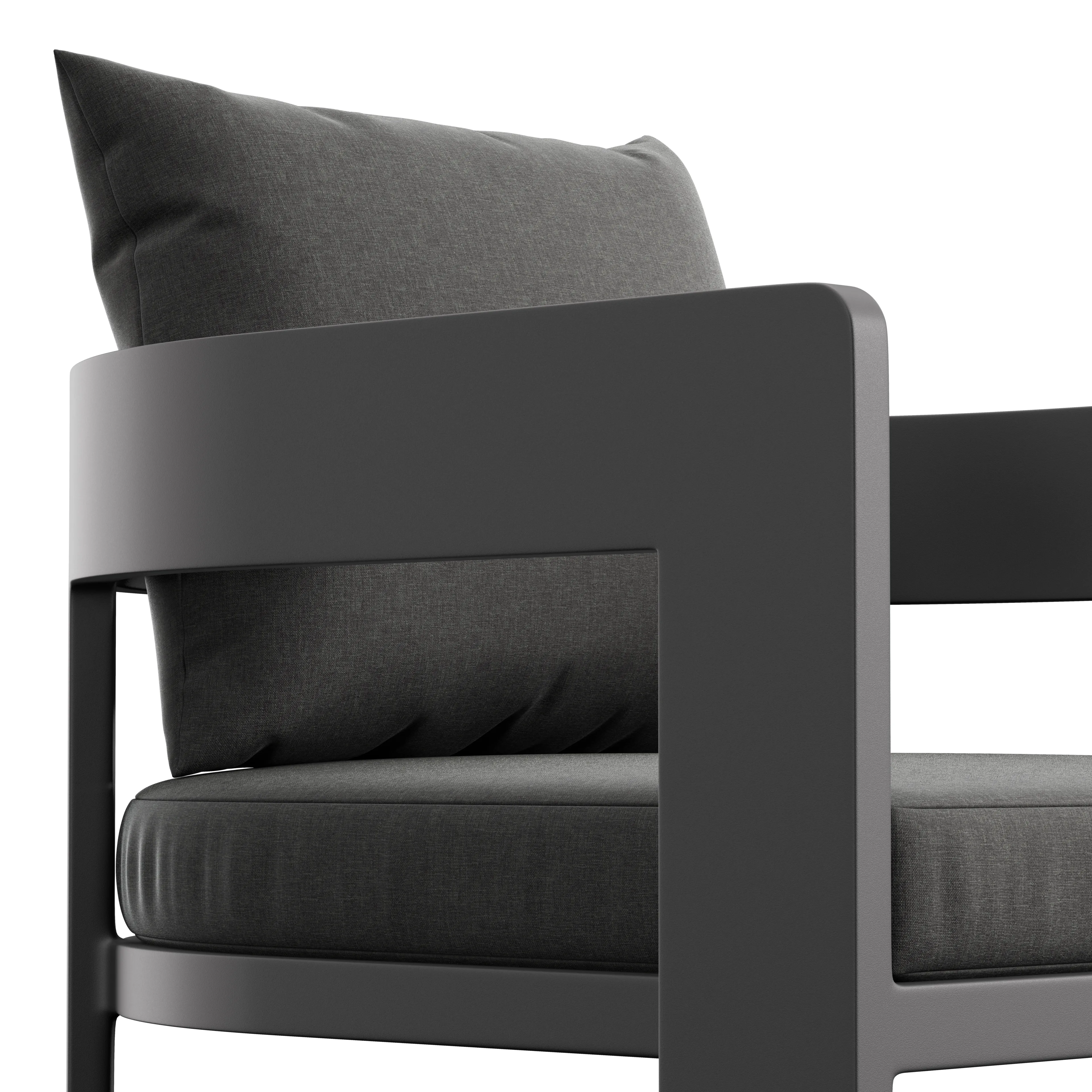 Close-up of a modern dark gray stool showing a rounded rectangular frame armrest and plush fabric seat and back cushions.
